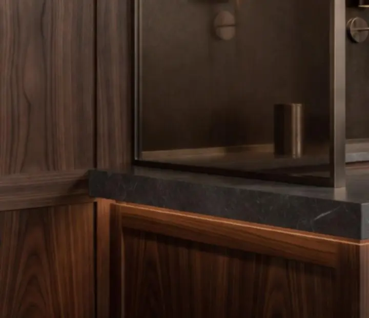 Walnut wood and bronze accented interior details in a contemporary Australian restaurant